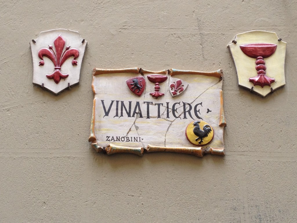 Vinattiere / Wine seller, showing the giglio (lily), symblol of Firenze & il gallo nero (black rooster), symbol of wine from the Chianti Classico wine territory