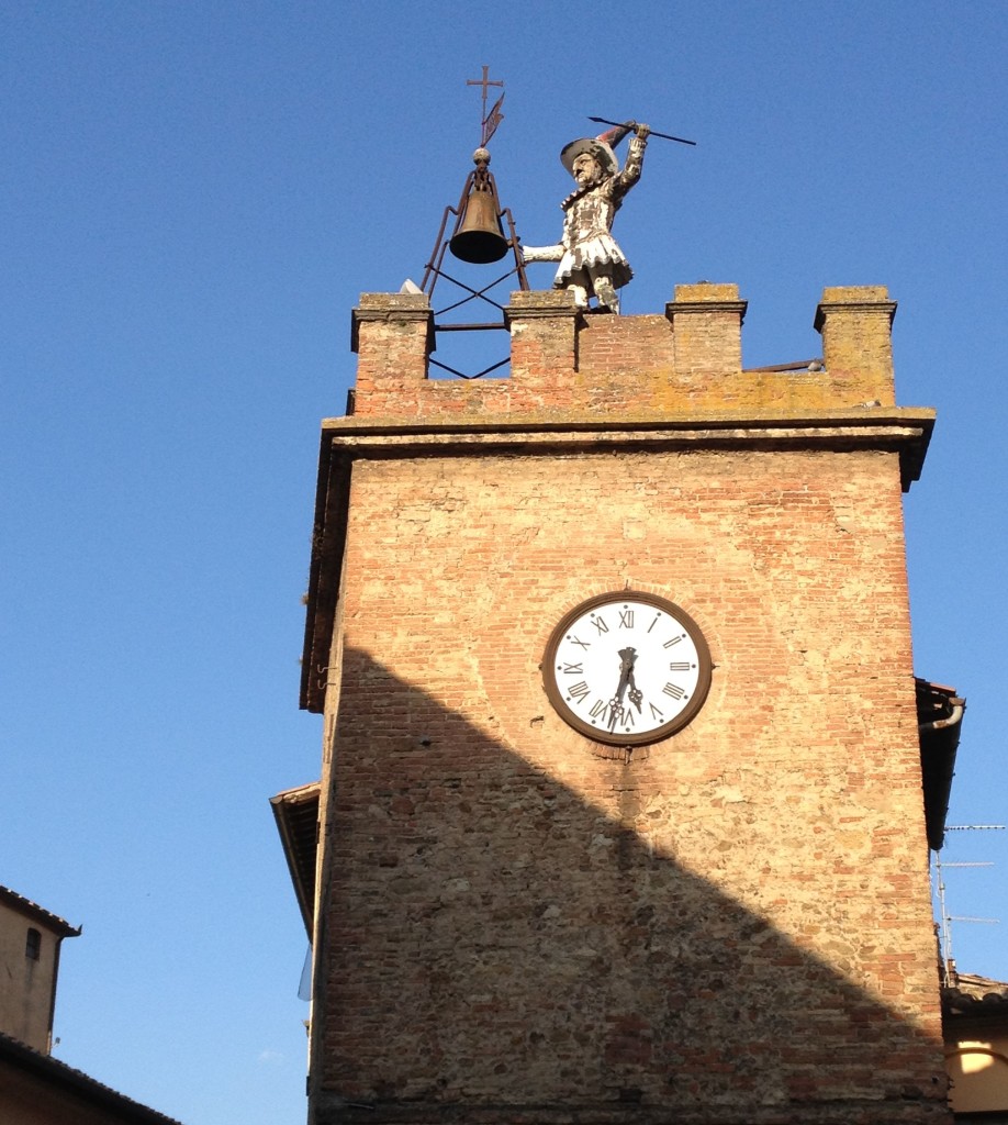 bellringer atop clock tower