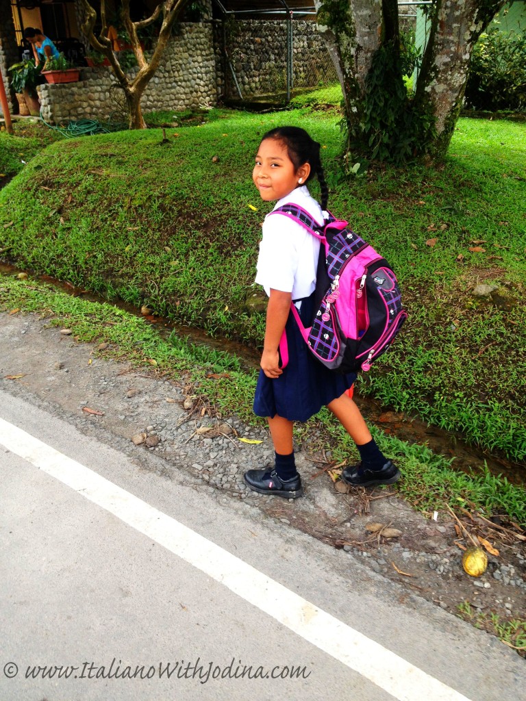school girl walking along country road
